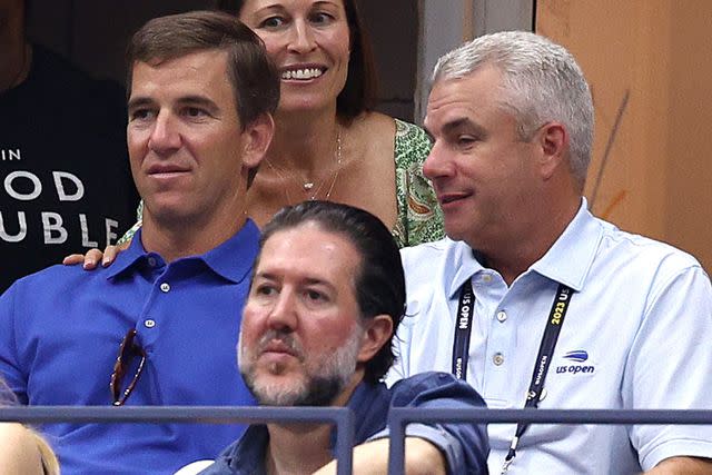 <p>Elsa/Getty</p> Eli Manning at the 2023 US Open women's final