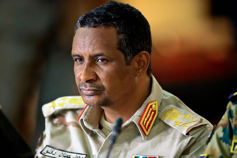 (FILES) In this file photo taken on June 8, 2022 Sudan's paramilitary Rapid Support Forces commander, General Mohamed Hamdan Daglo (Hemedti), now de facto deputy military leader, attending a meeting in Khartoum. - The Sudanese army said on April 15, 2023 that paramilitaries attacked its bases in Khartoum and elsewhere, shortly after the paramilitary said their camps were attacked by the regular army. (Photo by ASHRAF SHAZLY / AFP)