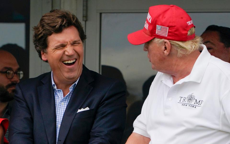 Tucker Carlson and Donald Trump