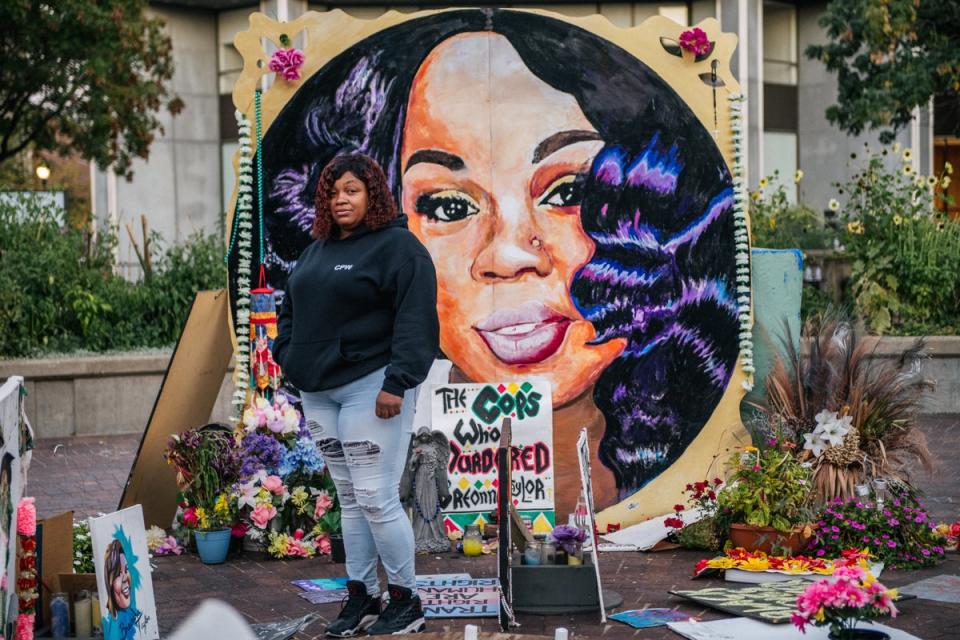 Tamika Palmer, mother of Breonna Taylor, poses for a portrait in front of a mural of her daughter at Jefferson Square park in 2020 (Getty Images)