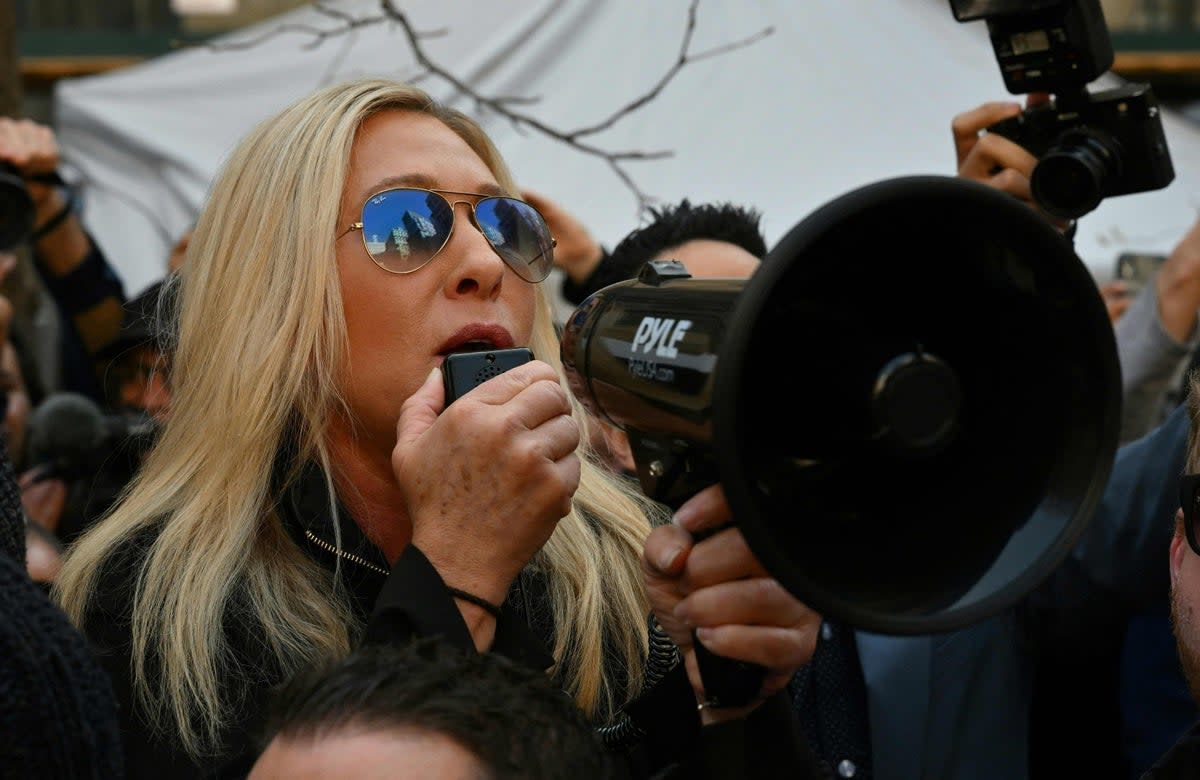 Rep. Marjorie Taylor Green says releasing the Jan 6 tapes would endanger law-abiding protesters (AFP via Getty Images)