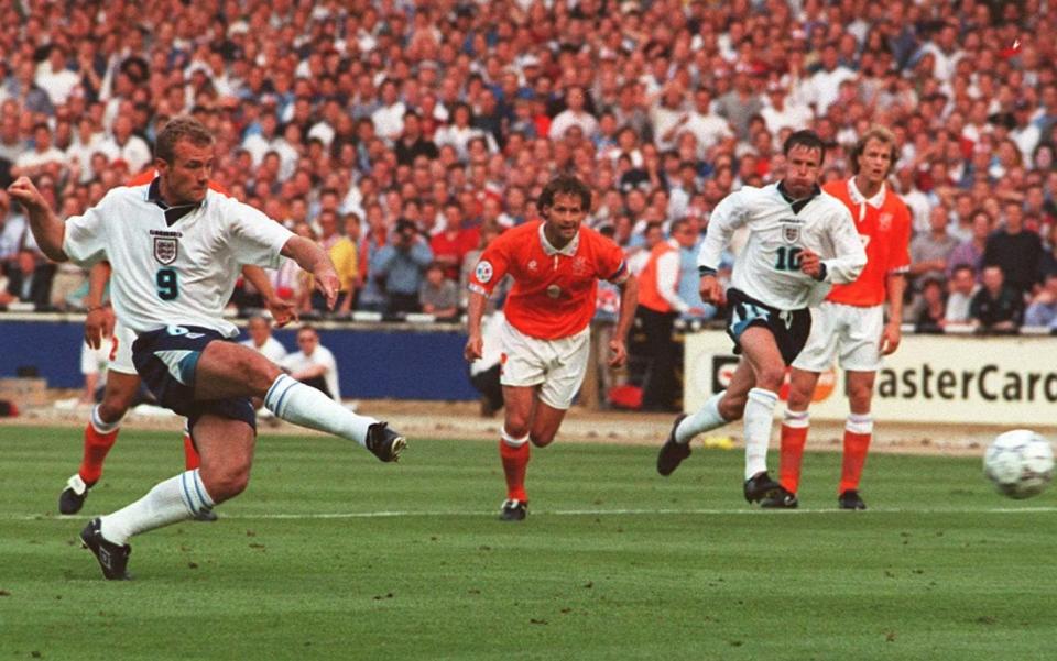 lan Shearer scores from a penalty to open the scoring for England in tonight's (Tues) Euro 96 clash against Holland at Wembley. Photo by Neil Munns/PA ... Soccer - Euro 96 - Group A - England v Netherlands - Wembley Stadium ... 18-06-1996 ... WEMBLEY ... UK ... Photo credit should read: Neil Munns/PA Archive. Unique Reference No. 1025144 ...