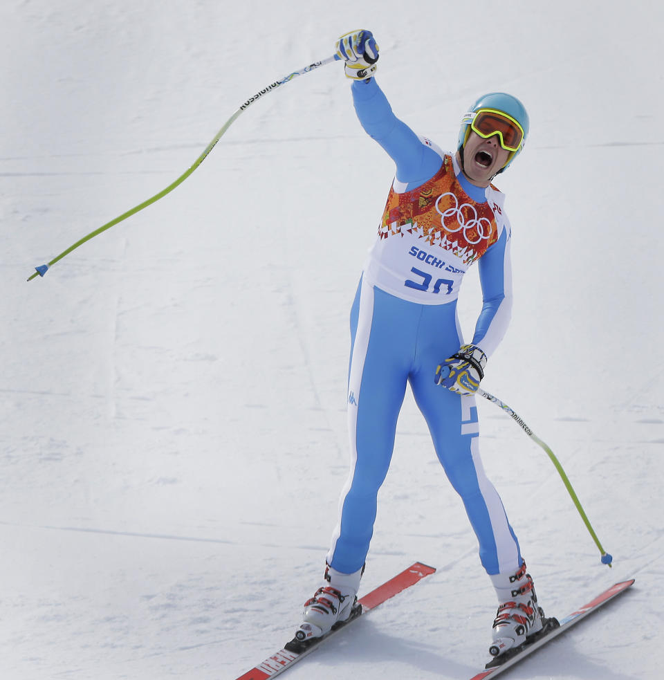 Italy's Christof Innerhofer celebrates after finishing the mens's downhill event at the 2014 Winter Olympics, Sunday, Feb. 9, 2014, in Krasnaya Polyana, Russia. Innerhofer finished second in the event. (AP Photo/Charlie Riedel)