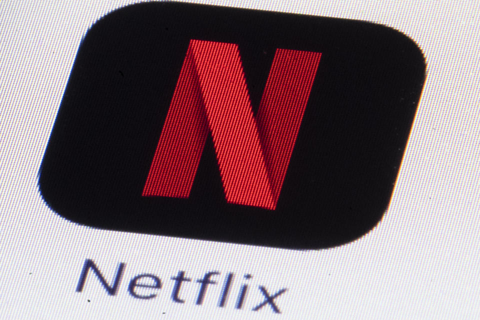 FILE - This Monday, July 17, 2017, file photo shows the Netflix logo on an iPhone in Philadelphia. Streaming services ranging from Netflix to Disney+ want us to stop sharing passwords. That's the new edict from the giants of streaming media, who hope to discourage the common practice of sharing account passwords without alienating their subscribers, who've grown accustomed to the hack. (AP Photo/Matt Rourke, File)