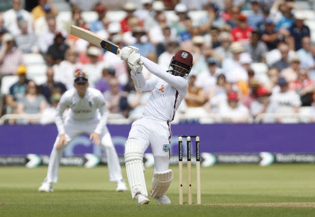 West Indies batter Shamar Joseph launches a shot over the leg side against England