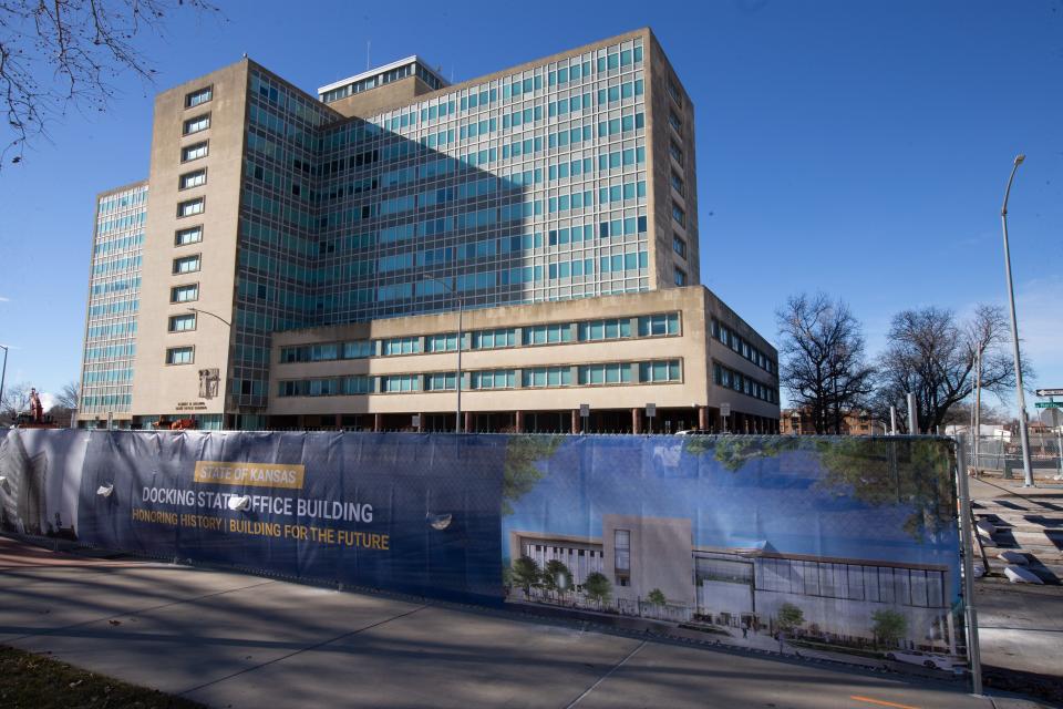 A rendering of a remodeled Docking State Office Building is seen on fencing surrounding the building at 915 S.W. Harrison St.