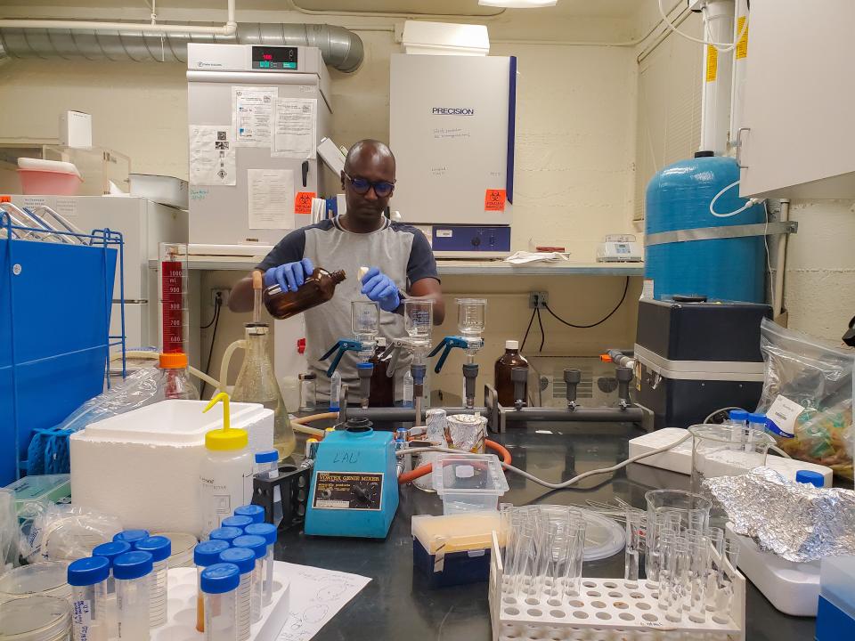 Thomas Hile, an affiliated researcher at Loma Linda University, prepares water samples for testing in a laboratory. Hile's recent study found contaminated water from soda fountain machines in Southern California.