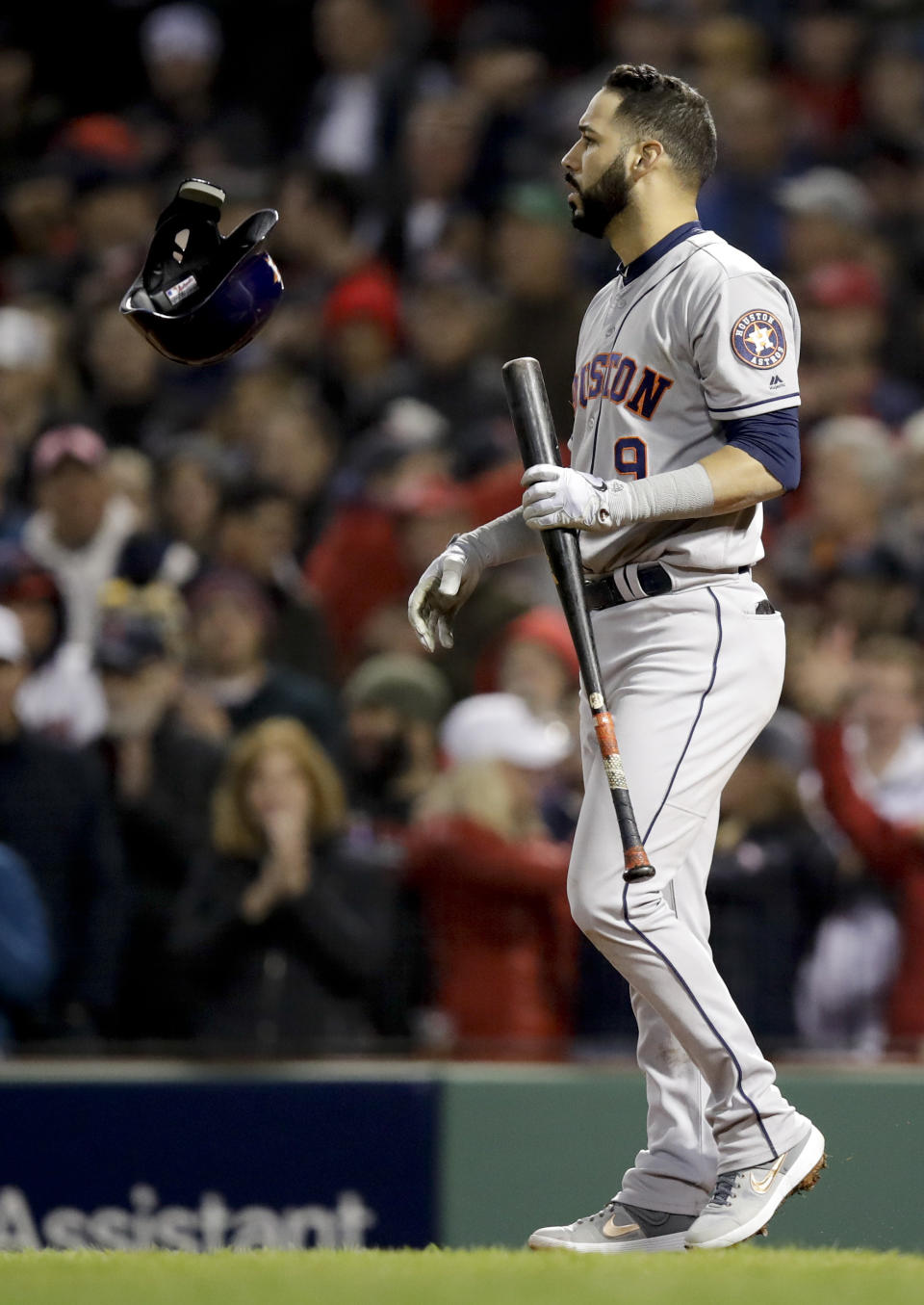 Houston Astros' Marwin Gonzalez tosses helmet after striking out during the fifth inning in Game 2 of a baseball American League Championship Series against the Boston Red Sox on Sunday, Oct. 14, 2018, in Boston. (AP Photo/Charles Krupa)