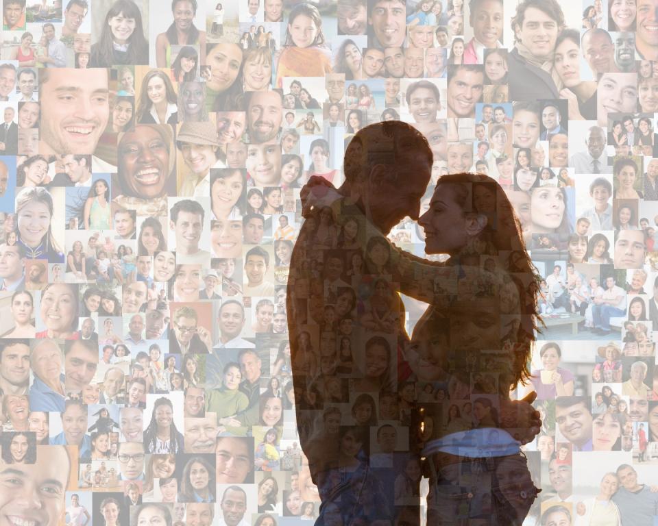 Couple hugging over collage of smiling face