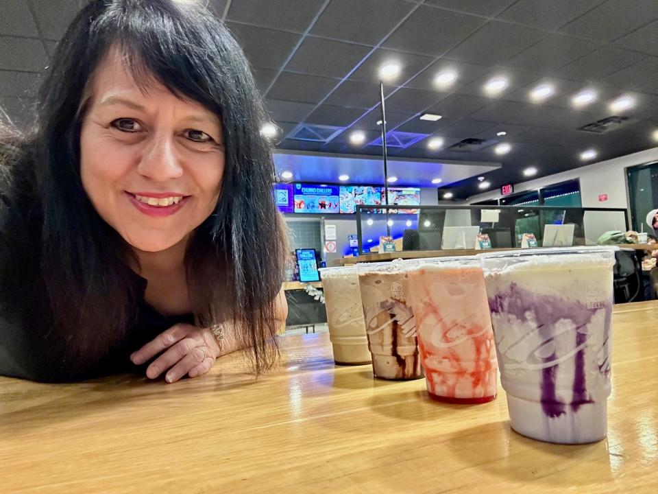 Nancy Luna tries the Churro Chillers at a Taco Bell in Irvine, California.