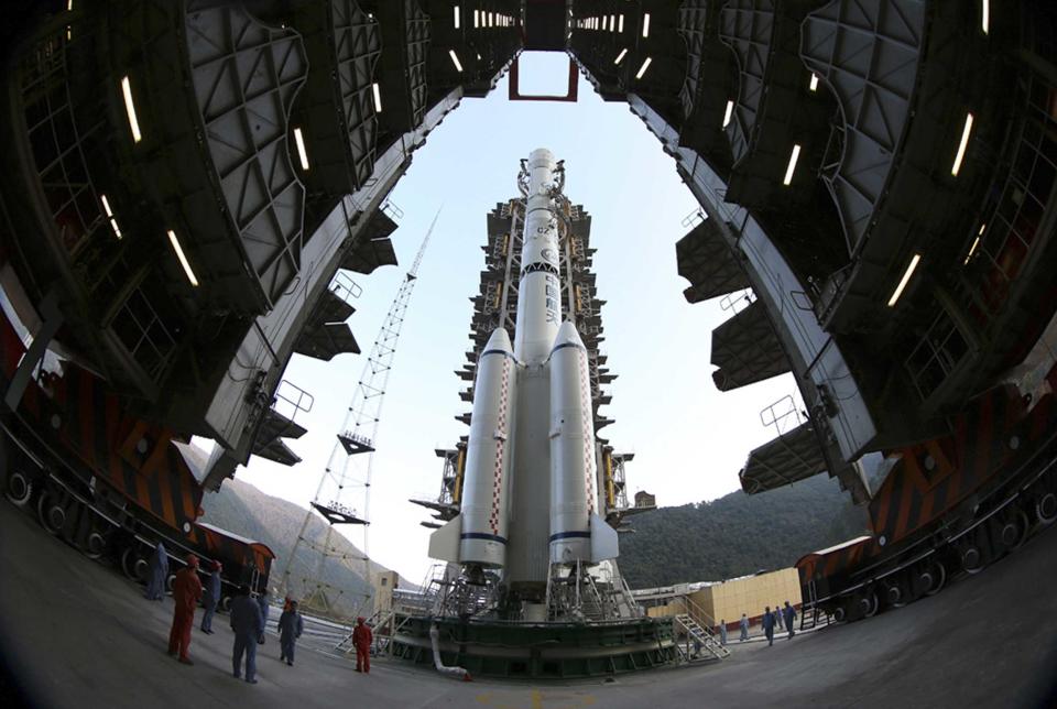 The Long March 3B rocket carrying the Chang'e-3 lunar probe is seen docked at the launch pad at the Xichang Satellite Launch Center in Liangshan, Sichuan province December 1, 2013. China will launch Chang'e-3 lunar probe at 1:30 a.m. on Monday which will deploy a buggy to explore its surface, marking a major milestone in the country's space ambitions. Chang'e-3 comprises a lander and a moon rover called "Yu Tu" (Jade Rabbit). The lunar probe is expected to land on the moon in mid-December if everything goes according to plan. (REUTERS/Stringer)