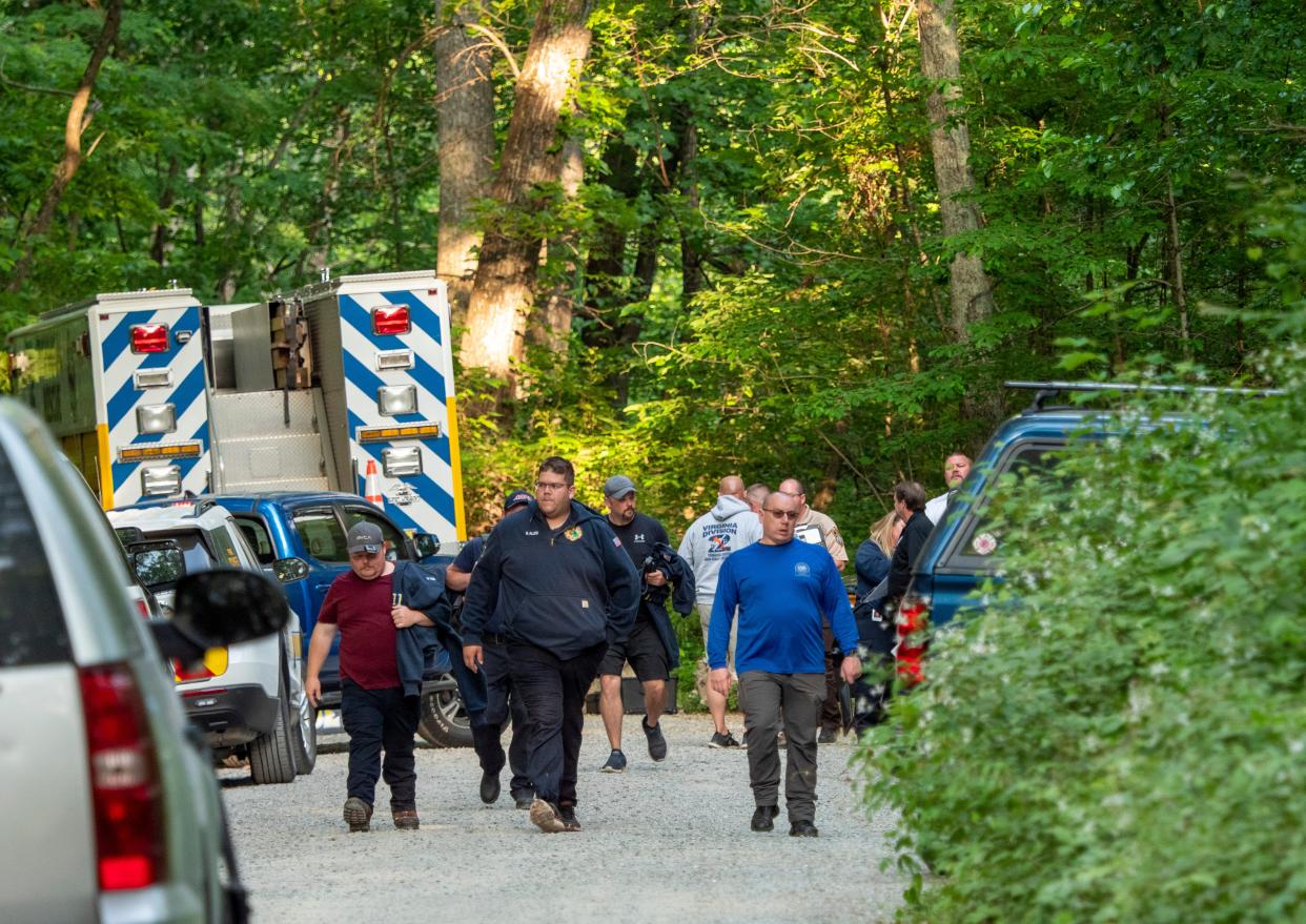 Search and rescue teams leave the command post at St. Mary's Wilderness en route to the Blue Ridge Parkway to search for the site where a Cessna Citation crashed over mountainous terrain near Montebello, Va., Sunday, June 4, 2023 (AP)