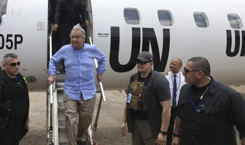 Surrounded by UN security, UN Sec General, Antonio Guterres, arrives in Mogadishu Tuesday April 11, 2023. U.N Secretary-General Antonio Guterres has appealed for “massive international support” for Somalia as he visited the East African country that is facing the worst drought in decades. (AP Photo)