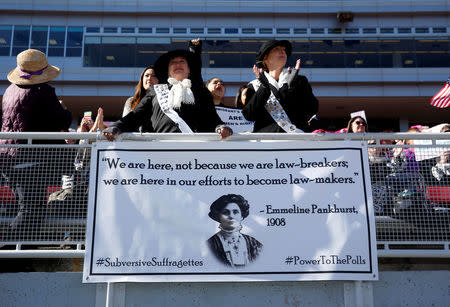 Women dressed as suffragettes attend the Women's March rally in Las Vegas, Nevada, U.S. January 21, 2018. REUTERS/Steve Marcus