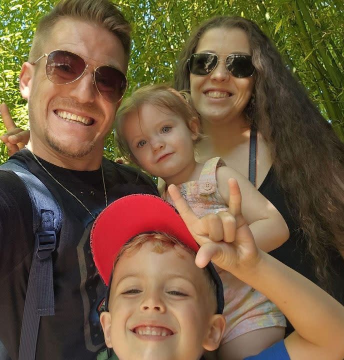 Russell Breski, his fiancée Dakota and their two children