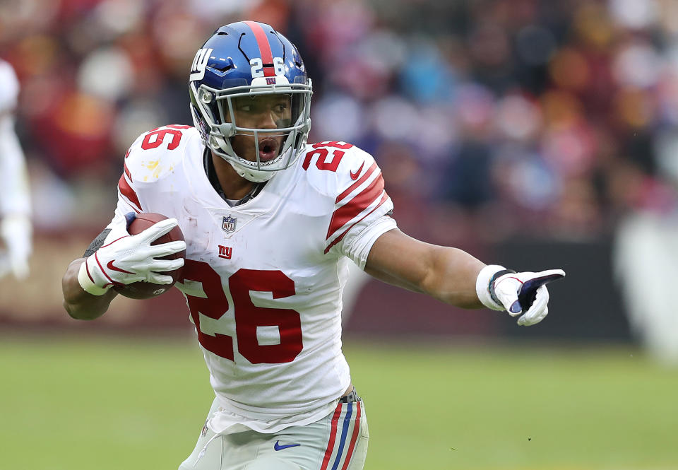 Saquon Barkley is one of the few running backs with a guaranteed share of his team's carries heading into the season. (Photo by Rob Carr/Getty Images)