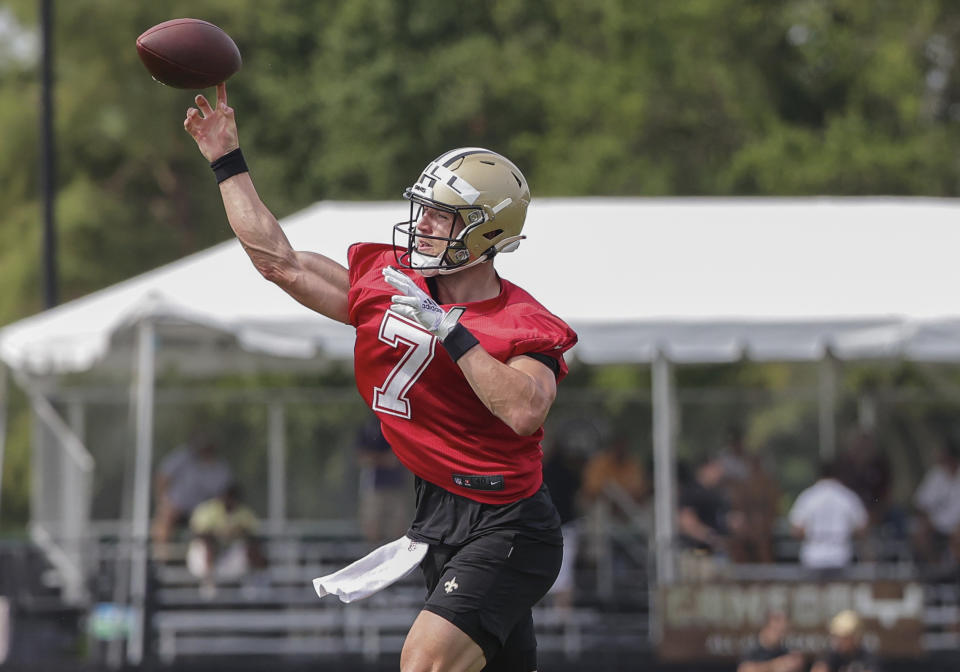 New Orleans Saints quarterback Taysom Hill (7) throws during NFL football training camp in Metairie, Friday, July 30, 2021. (AP Photo/Derick Hingle)