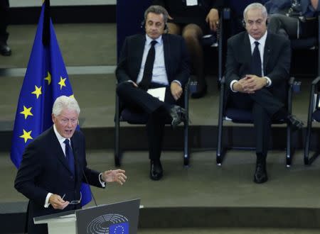 Former U.S. President Bill Clinton delivers a speech during of a memorial ceremony in honour of late former German Chancellor Helmut Kohl at the European Parliament in Strasbourg, France, July 1, 2017. REUTERS/Francois Lenoir