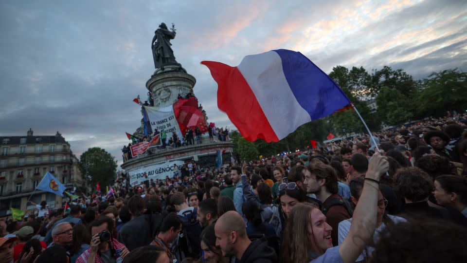 Crowds of most young people gathered at Place de la République in Paris to celebrate keeping the far right at bay. - Emmanuel Dunand/AFP/Getty Images