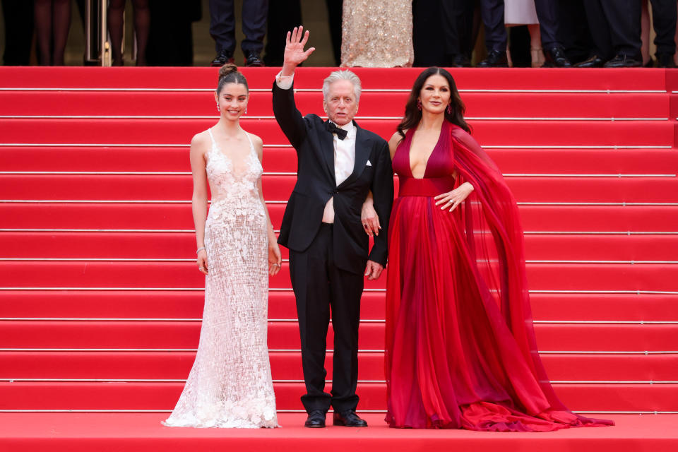 CANNES, FRANCE - MAY 16: (L-R) Carys Zeta Douglas, Michael Douglas and Catherine Zeta-Jones attend the 