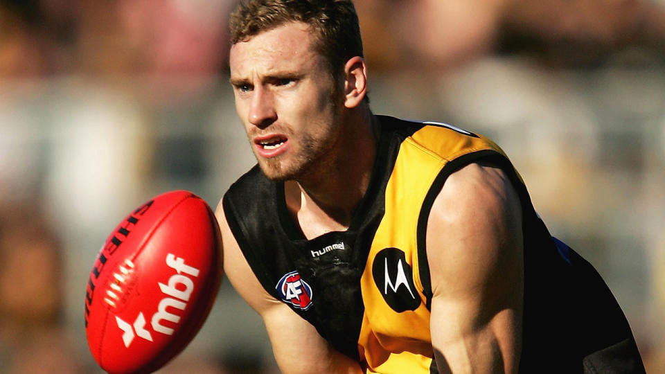 Former Richmond Tigers player Shane Tuck is pictured playing in 2006. Tuck was found dead on Monday, aged 38.  (Photo by Ryan Pierse/Getty Images)