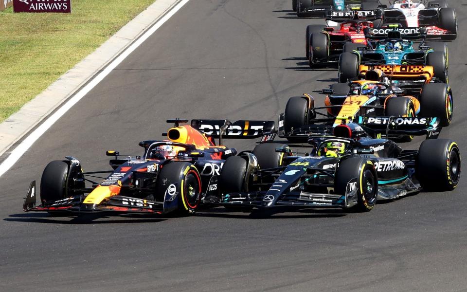 Red Bull's Max Verstappen leads Mercedes' Lewis Hamilton at the start of the race