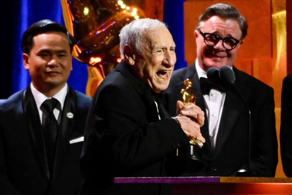 <p>Michael Buckner/Variety via Getty</p> Nathan Lane presents Mel Brooks with an Honorary Oscar at the 14th Governors Awards in Los Angeles on Jan. 9, 2024