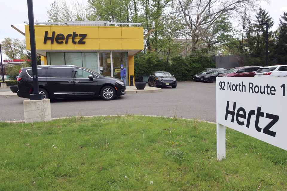 FILE - In this May 6, 2020, file photo, a Hertz car rental is closed during the coronavirus pandemic in Paramus, N.J. Hertz filed for bankruptcy protection Friday, May 22, 2020, unable to withstand the pandemic that has crippled global travel and with it, the heavily indebted 102-year-old car rental company's business. (AP Photo/Ted Shaffrey, File)