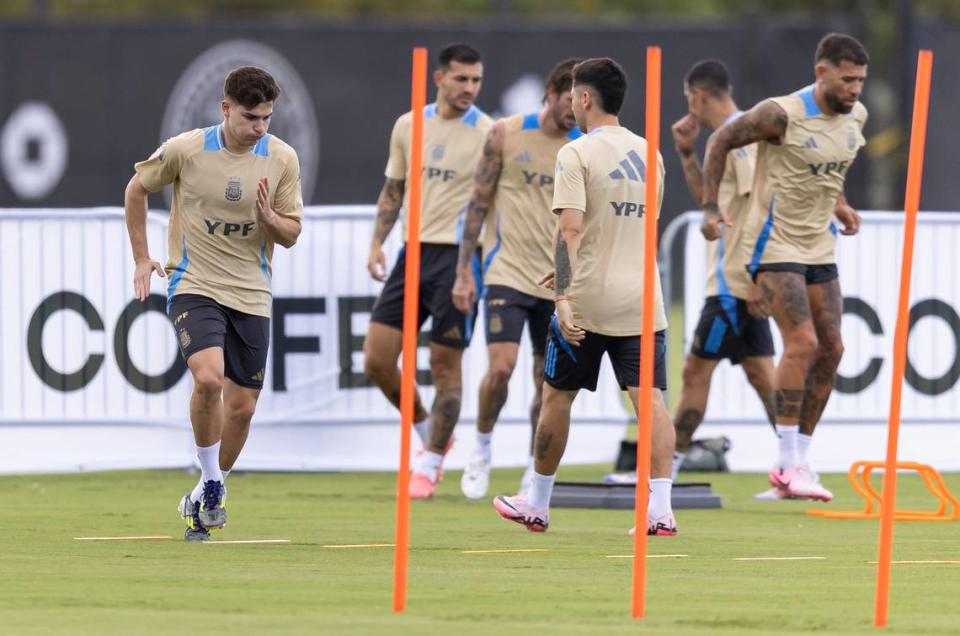 Argentina’s forward Julián Álvarez, far-left, runs drills with his teammates at the Florida Blue Training Center.