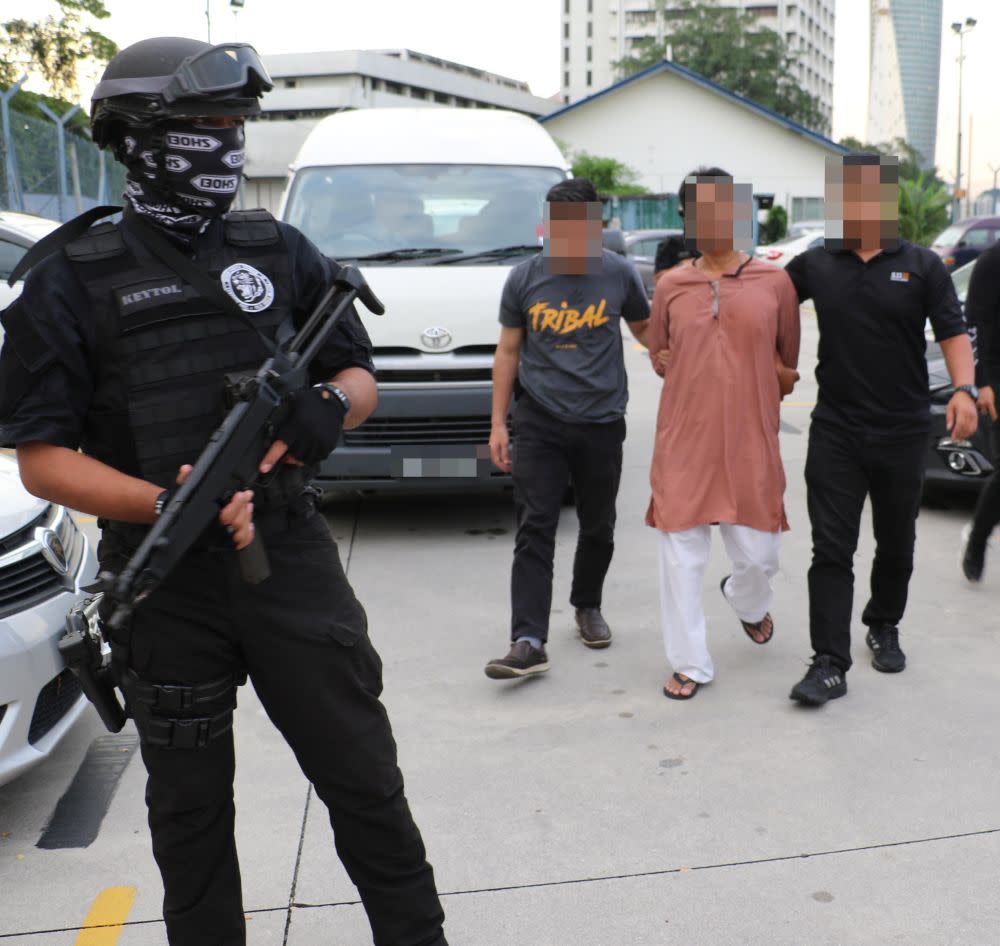 A 54-year-old Filipino electrician was among those detained for terrorism offences. — Picture courtesy of PDRM