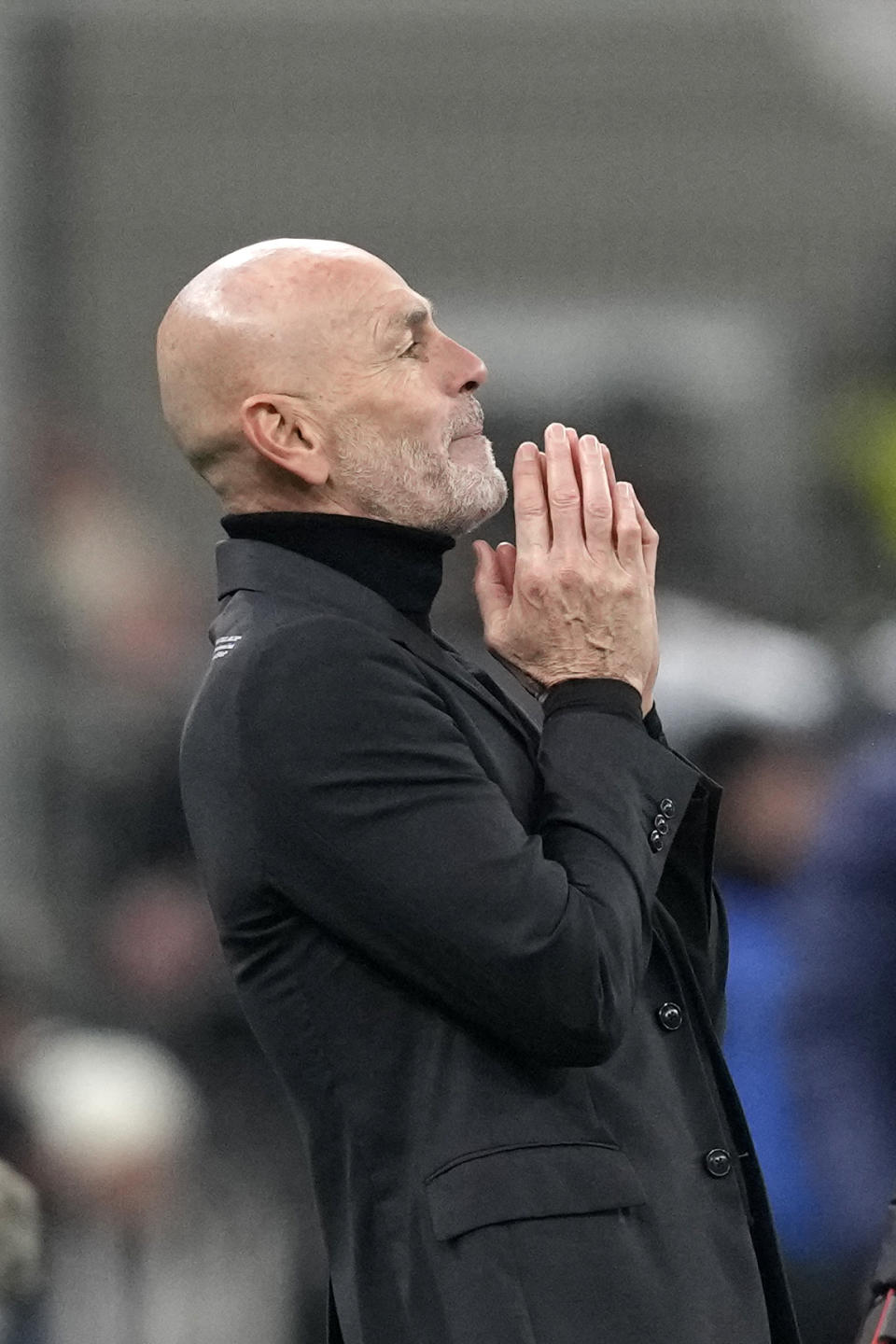 AC Milan's manager Stefano Pioli reacts during the Serie A soccer match between Inter Milan and AC Milan at the San Siro Stadium, in Milan, Italy, Sunday, Feb. 5, 2023. (AP Photo/Antonio Calanni)