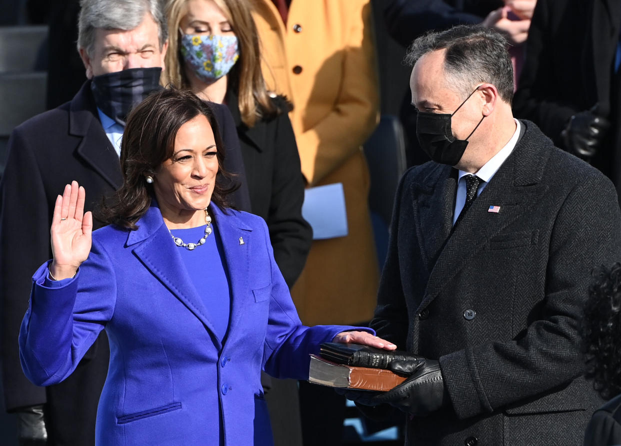 Kamala Harris, flanked by her husband Doug Emhoff, is sworn in as the vice president of the United States on Jan. 20. (Photo: BRENDAN SMIALOWSKI via Getty Images)