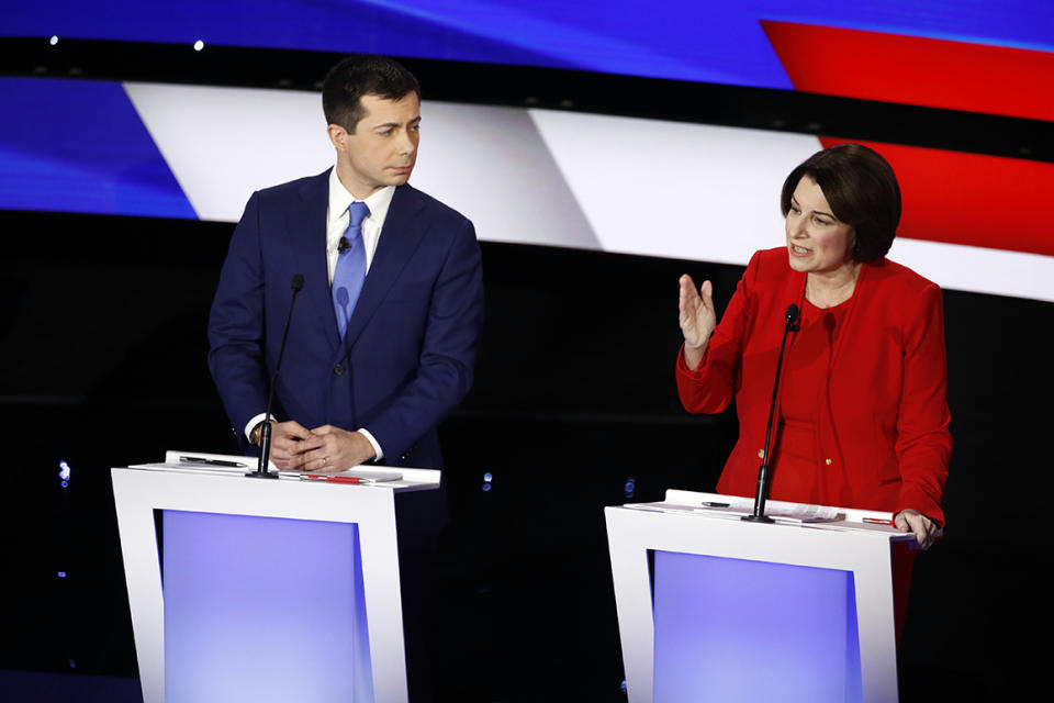 Democratic presidential candidate Sen. Amy Klobuchar, D-Minn., answers a question as candidate former South Bend Mayor Pete Buttigieg listens Tuesday, Jan. 14, 2020, during a Democratic presidential primary debate hosted by CNN and the Des Moines Register in Des Moines, Iowa. (AP Photo/Patrick Semansky)