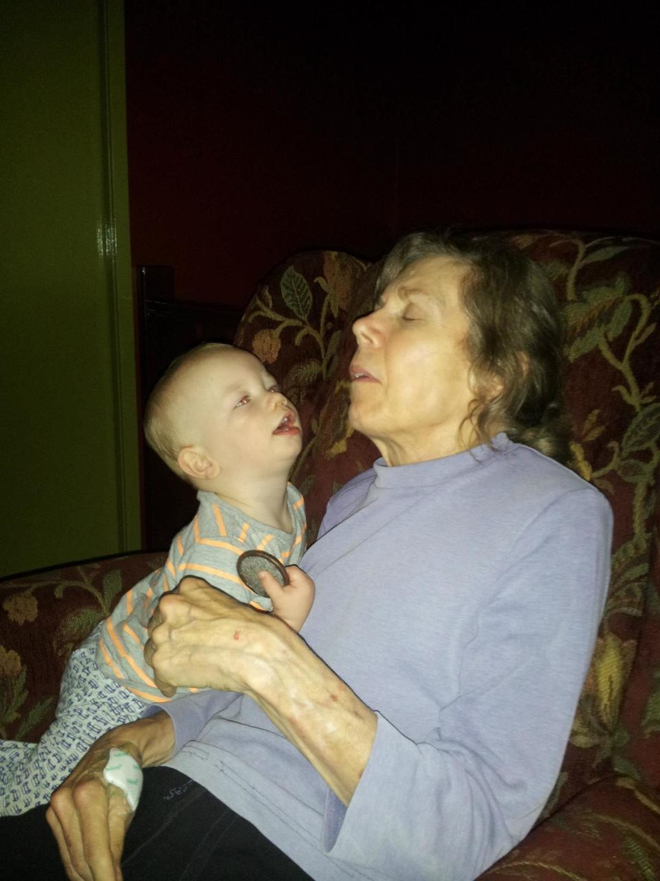 <strong>Cuddles with her 14-month-old grandson. He's very careful with her, knows she's special. </strong>