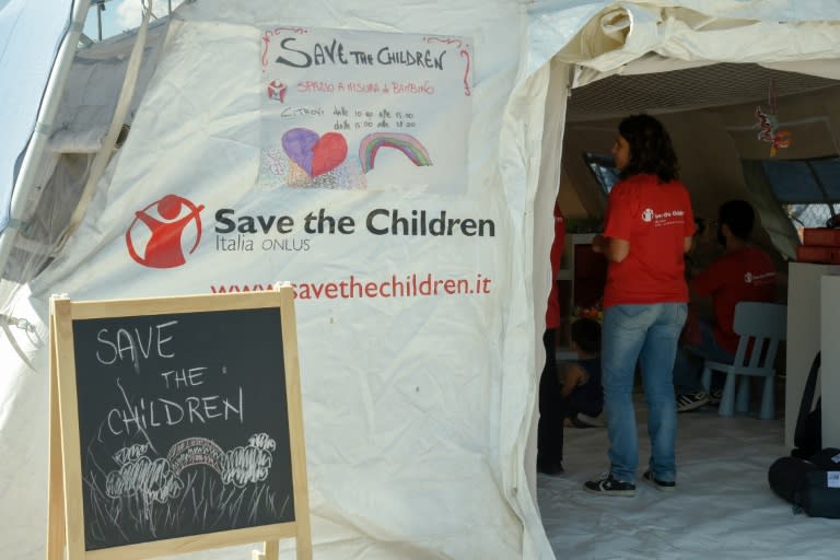 A Save the Children tent inside a camp for quake victims designed to create a space where children can be with their peers and express themselves through play and drawing