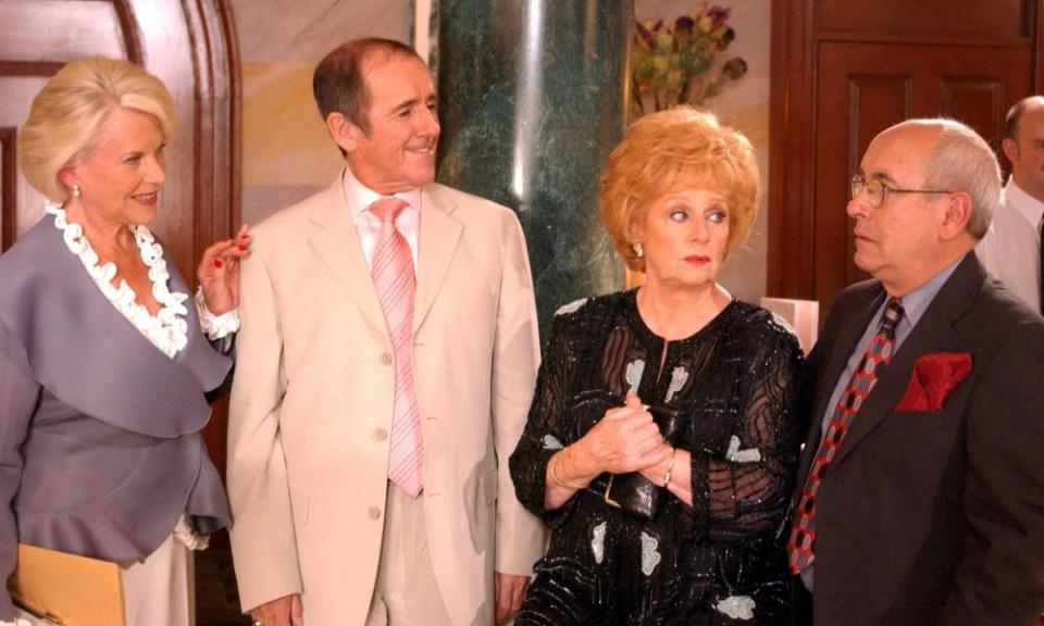 Duggie Brown, second from left, as Bernie, with, from left, Honor Blackman as Rula, Barbara Knox as Rita and Malcolm Hebden as Norris in a 2004 episode of Coronation Street.