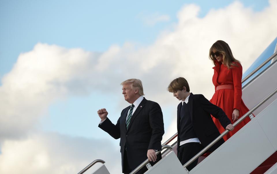 Trump, son Barron and wife Melania step off Air Force One at Palm Beach International Airport in West Palm Beach, Florida, on March 17, 2017.