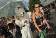 BERLIN, GERMANY - AUGUST 13: People, including one person dressed as a dog, participate the "Slut Walk" march on August 13, 2011 in Berlin, Germany. Several thousand men and women turned out to protest against rape and a woman's right to her body. (Photo by Sean Gallup/Getty Images)