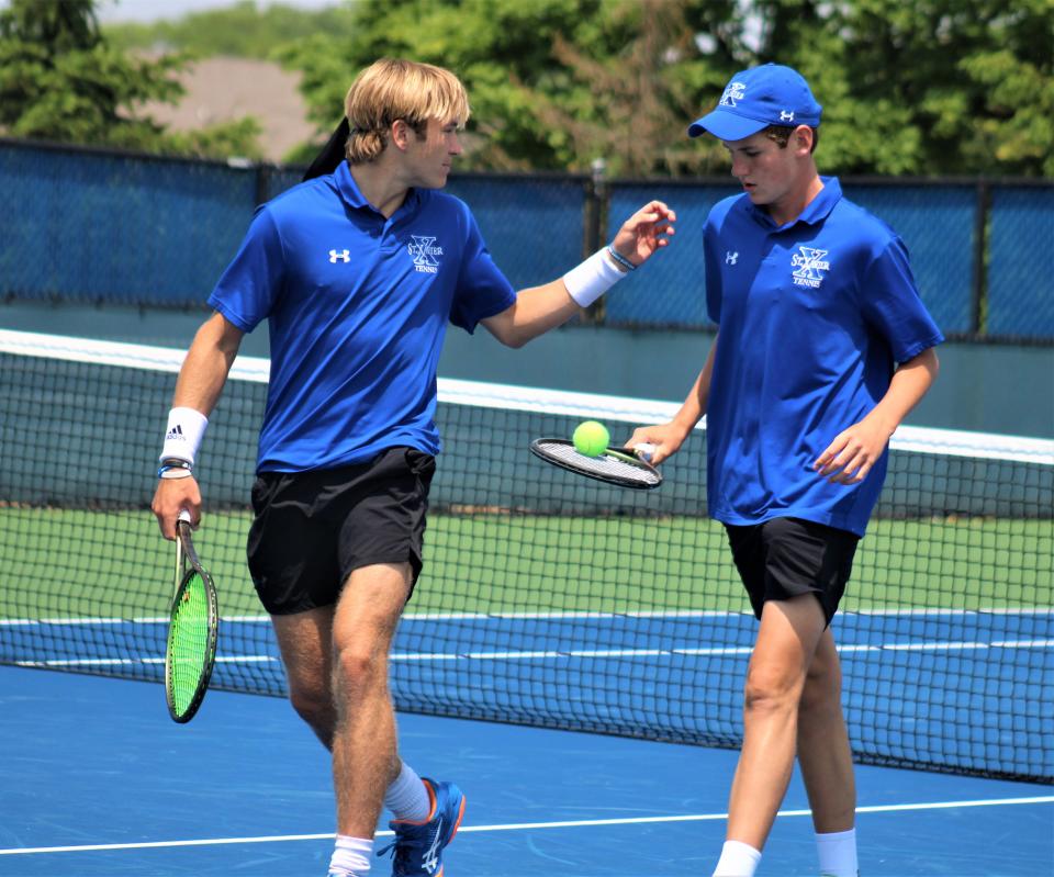 Sophomore Carson Dwyer, right, returns to the Bombers after being one half of a Division I state championship doubles team in 2023.
