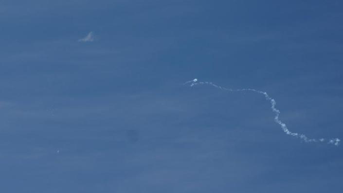 A view of what is believed to be a suspected Chinese spy balloon when it was shot down, seen from Holden Beach, U.S., February 4, 2023.