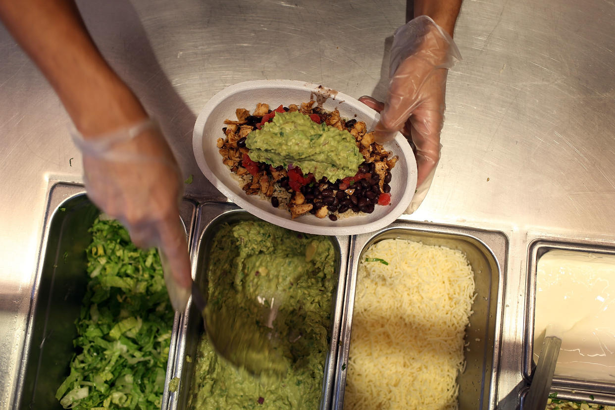An employee at a Chipotle in Greenville, South Carolina was immediately fired after he allegedly struck a coworker in the face after play fighting. (Photo by Joe Raedle/Getty Images)
