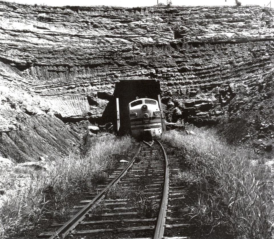 A diesel locomotive exiting Clarity Tunnel, circa 1950.