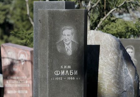A view shows the gravestone (C) of British double agent Kim Philby at a cemetery in Moscow, Russia, April 4, 2016. REUTERS/Sergei Karpukhin