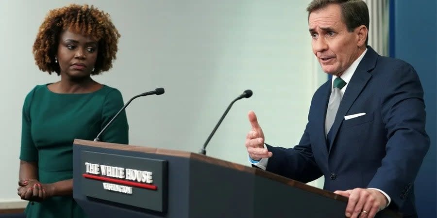 Karin Jean-Pierre and John Kirby during a press briefing at the White House on December 6, 2023