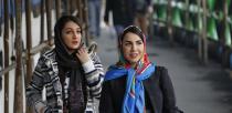 <p>Des Iraniennes ont décidé de réclamer la liberté de retirer leur voile. Pour cela, elles ont créé le hashtag #MyCameraIsMyWeapon. Crédit photo : Atta Kenare / AFP </p>