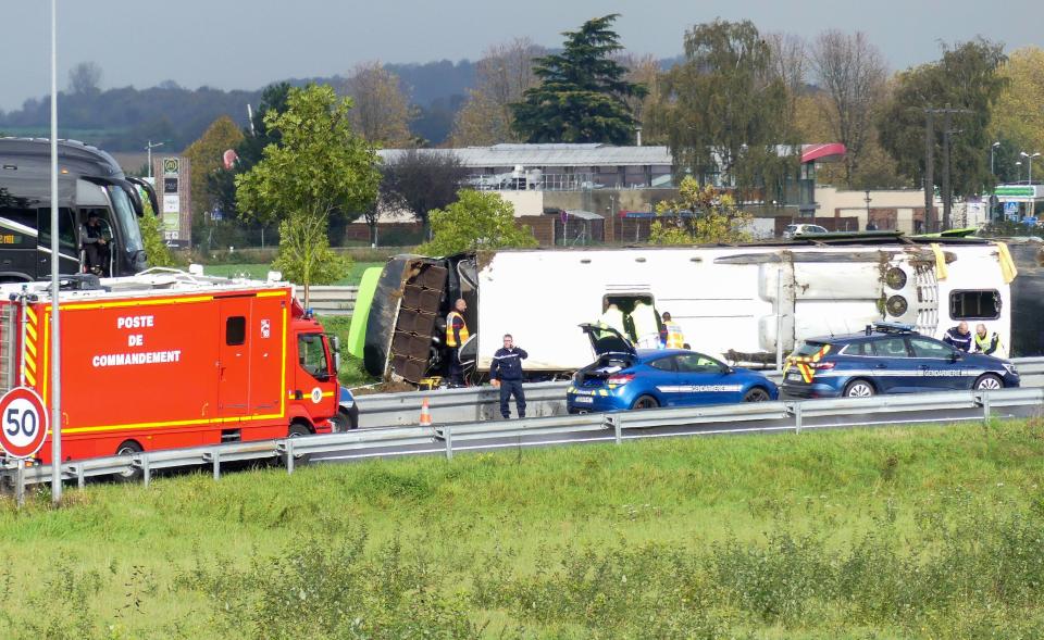 Emergency services are at work on the site of an accident after a bus from the Flixbus company overturned as it took an exit from the A1 motorway, injuring 29 passengers and seriously wounding 4, on November 3, 2019 near Berny-en-Santerre, northern France. (Photo by - / AFP) (Photo by -/AFP via Getty Images)