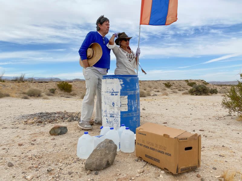 John Hunter, a supporter of U.S. President Donald Trump, and his wife Laura, who doesn't support Trump, set up water stations for people illegally crossing the US-Mexico border