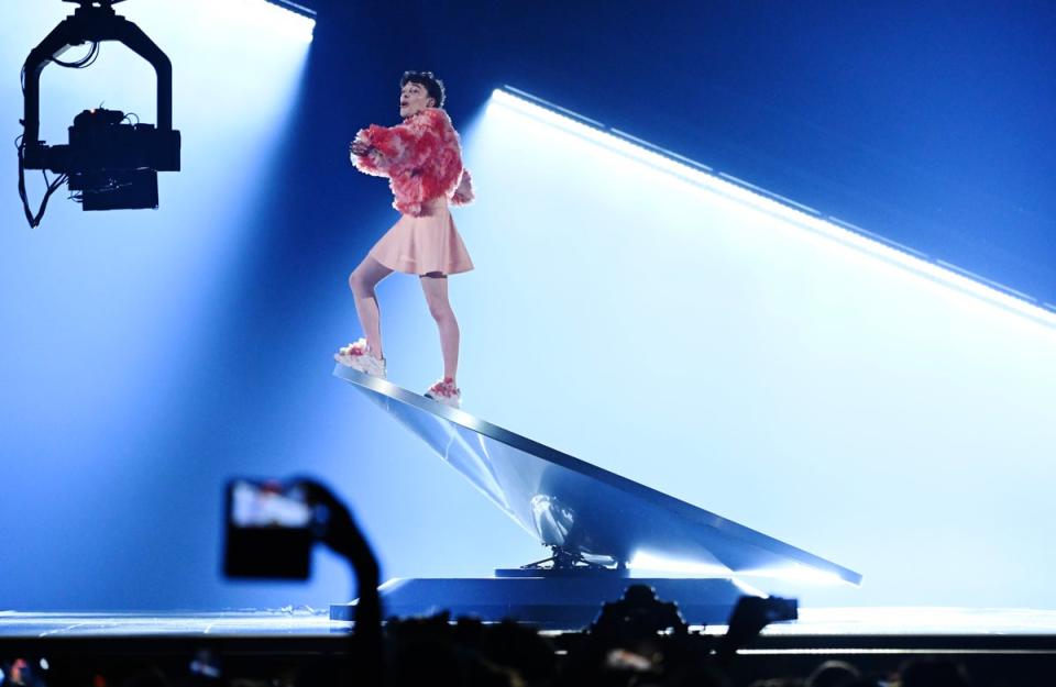 Nemo representing Switzerland with the song 'The Code' performs during the final of the 68th edition of the Eurovision Song Contest (EPA)