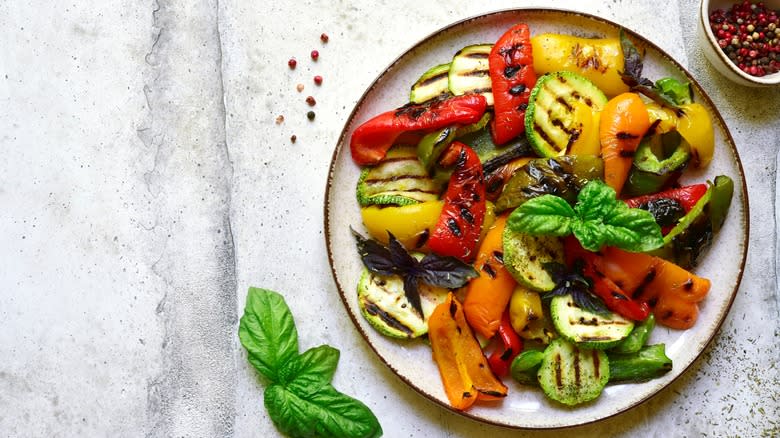 Grilled vegetables on table
