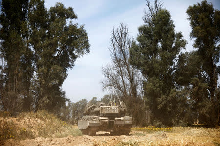 An Israeli tank is deployed near the border between Israel and the Gaza Strip, Israel March 18, 2018. REUTERS/Amir Cohen